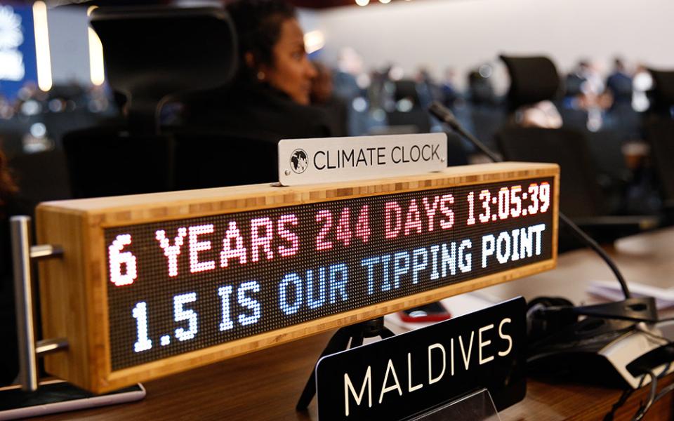 A "Climate Clock" is seen with the Maldives delegation during the closing plenary of COP27 in Sharm el-Sheikh, Egypt, Nov. 20. (Flickr/UNclimatechange)