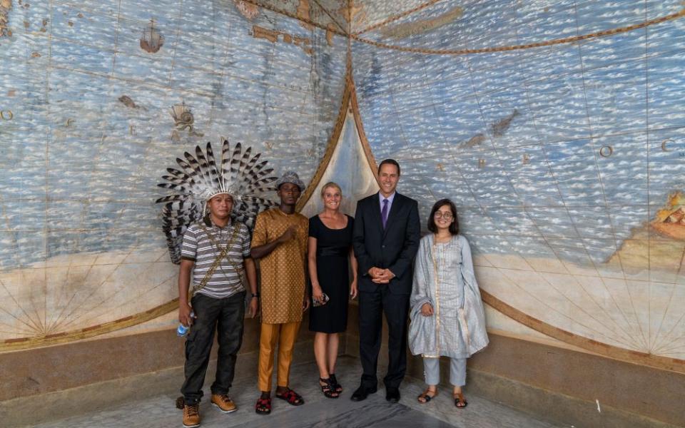 Chief Dadá Borarí from the Maró Indigenous Lands of the Brazilian Amazon; Arouna Kandé, a climate change refugee from Senegal; U.S. scientists Robin Martin and Greg Asner; and teenage climate activist Ridhima Pandey of India participated in the making of the documentary "The Letter." They are seen inside the Apostolic Palace at the Vatican Aug. 26, 2021. (CNS/courtesy Off the Fence)