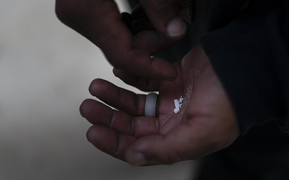 A homeless person holds pieces of fentanyl Aug. 18, 2022, in Los Angeles. Last year saw an overall increase in drug overdose deaths in the U.S. In New Jersey there have been more than 3,000 fatalities annually due to drug overdoses. (AP photo/Jae C. Hong)
