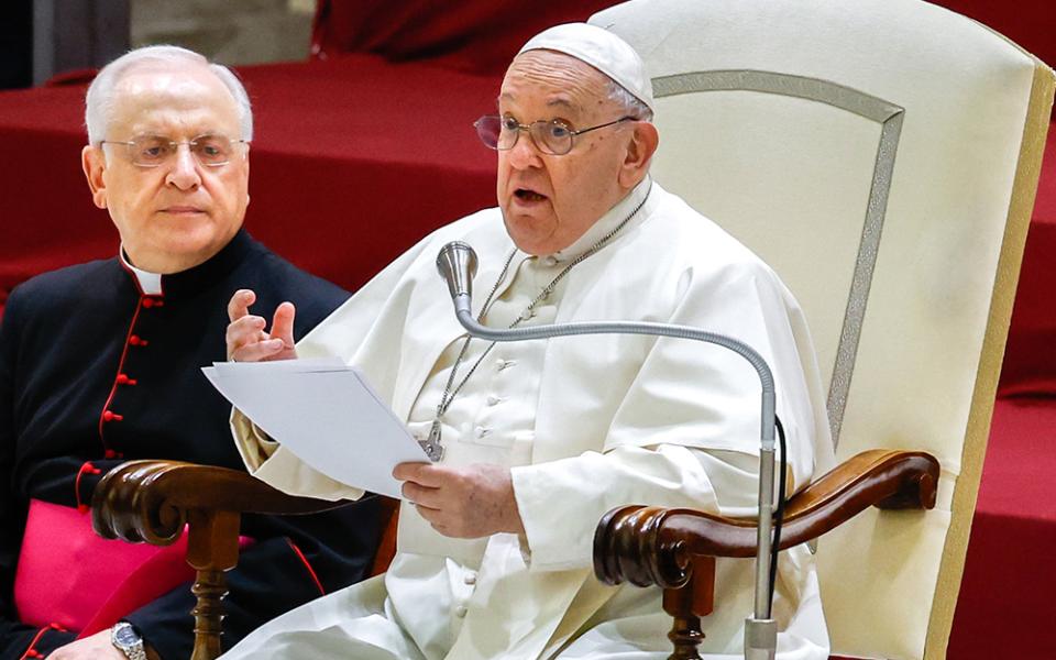 Pope Francis speaks to visitors during his general audience in the Paul VI Audience Hall at the Vatican Dec. 13. (CNS/Lola Gomez)