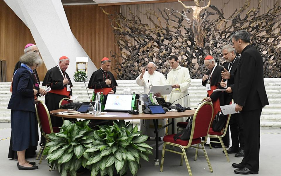 Pope Francis gives his blessing at the conclusion of the assembly of the Synod of Bishops' last working session Oct. 28, 2023, in the Paul VI Hall at the Vatican. (CNS/Vatican Media)