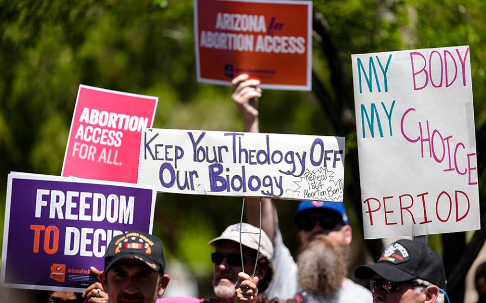 Abortion rights supporters gather April 17 outside the Arizona State Capitol in Phoenix. (AP/Matt York, File)