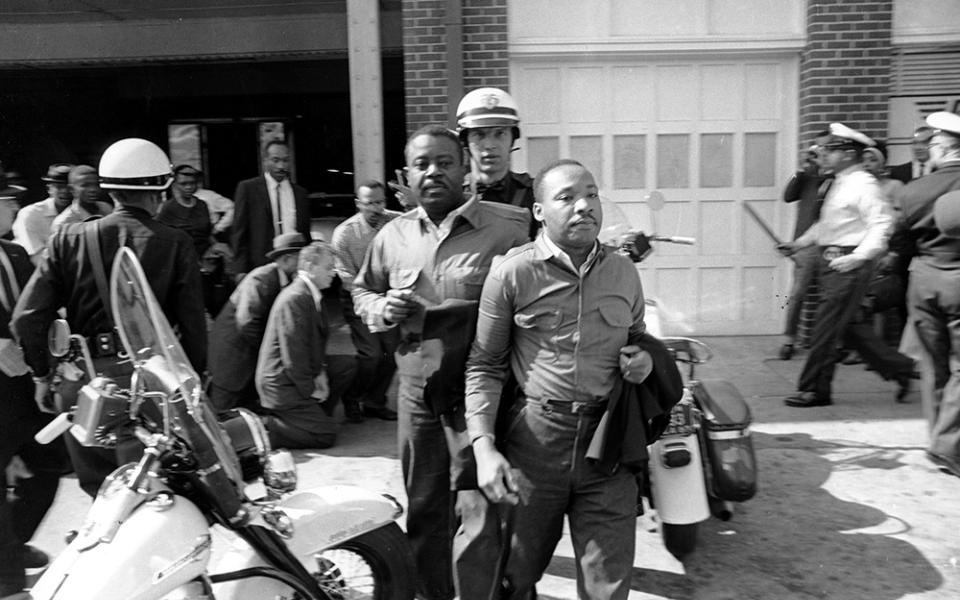 Police arrest the Rev. Martin Luther King Jr. (foreground) and the Rev. Ralph Abernathy at a Civil Rights demonstration in Birmingham, Ala., on April 12, 1963. (AP)