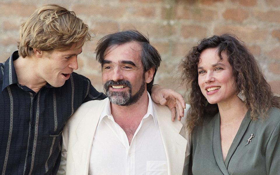 In this file photo dated Sept. 7, 1988, director Martin Scorsese, center, poses with the stars of his film, "The Last Temptation of Christ", actors Barbara Hershey, right, who plays Mary Magdalene, and William Dafoe who plays Christ, at the Venice Film Festival. The film released in 1988 in the face of denunciations from religious leaders. (AP photo, File)