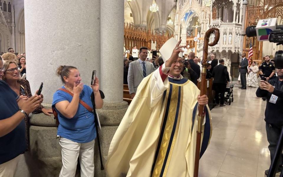  Auxiliary Bishop Bismarck Chau of Newark blesses the assembly at Cathedral Basilica of the Sacred Heart after he was consecrated as bishop during a Mass Sept. 8. Chau came to the U.S. as an undocumented immigrant from Nicaragua in 1984. (NCR photo/Camillo Barone)