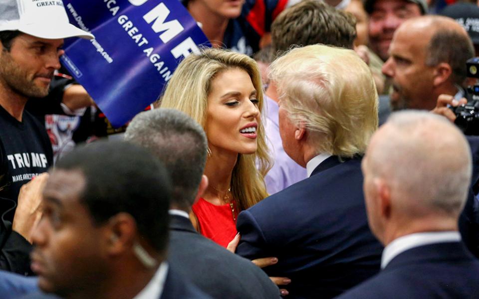 Donald Trump, at the time the Republican U.S. presidential candidate, embraces former Miss California USA Carrie Prejean Boller, a Catholic, after a rally with supporters in San Diego May 27, 2016. (OSV News/Reuters/Jonathan Ernst)