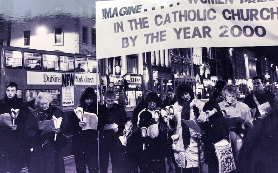 A banner reads "Imagine women priests in the Catholic Church by the year 2000" at the first World Day of Prayer for the Ordination of Women Priests, held March 25, 1994, in Dublin. (Courtesy of Soline Humbert)