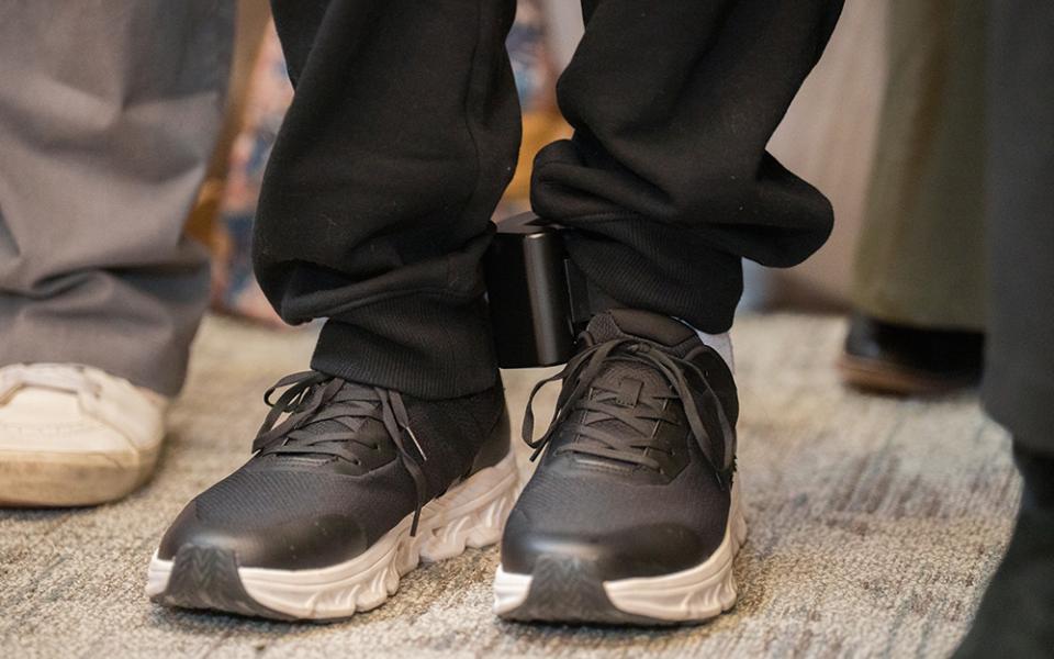 Dylan Lopez Contreras wears an ankle monitor during a press conference to welcome him home after being freed from ICE detention, March 19, 2026 in New York. Catholics in Harrisburg, Pennsylvania, are wearing faux ankle monitors in solidarity with migrants. (AP photo/Adam Gray)