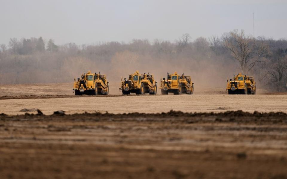 Earth movers prepare a site for a 2.5 million square foot AI data center March 24, 2026, in Independence, Mo. Globally, data centers rank behind all but 10 countries in electricity use, according to a new U.N. report. (AP/Charlie Riedel, file)
