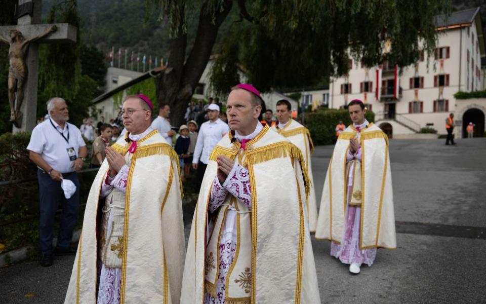 The newly consecrated SSPX bishops process to the seminary courtyard after the July1 consecration outside St. Pius X seminary, in Econe, Switzerland, July 1, 2026. (Courtesy of  Society of Saint Pius X)