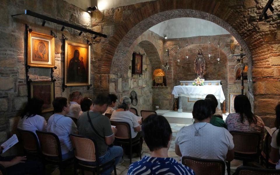 Visitors pray inside the Ephesus House, a replica of the House of the Virgin Mary in Ephesus, Turkey, at Alfonso town, Cavite province, Philippines on July 16, 2026. (AP/Aaron Favila)