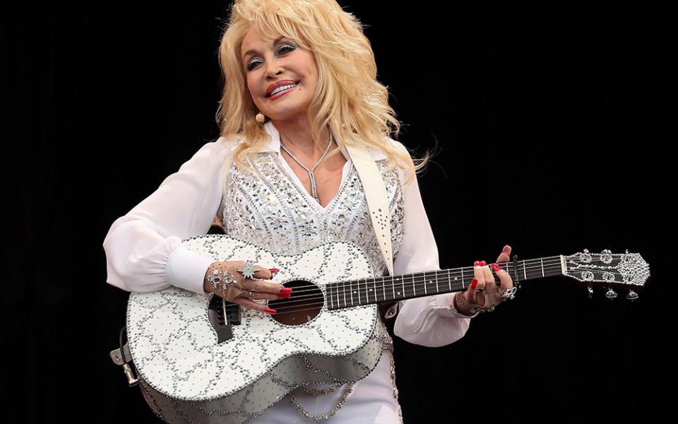 American country music star Dolly Parton performs on the Pyramid Stage at Worthy Farm in Somerset, England, during the Glastonbury Festival June 29, 2014. Parton, 80, died Aug. 25, 2026, after a brief battle with cancer. (OSV News/Reuters/Cathal McNaughton)