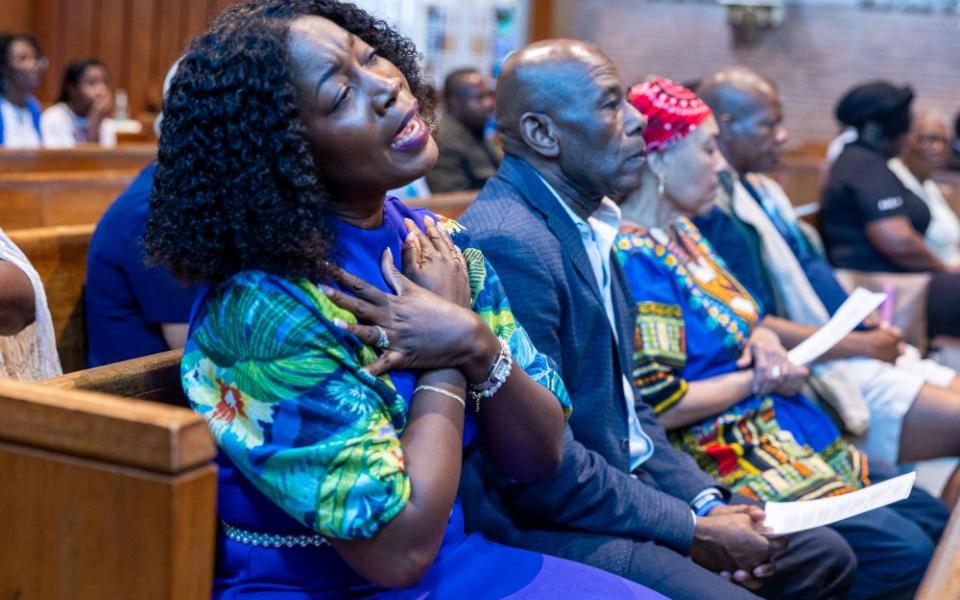 A woman sings at Our Lady of Sorrows Church in Takoma Park, Md., on July 28, 2026, during a Mass of solidarity with the Haitian community and those impacted by changes to U.S. immigration policy and Temporary Protected Status. (OSV News/Mihoko Owada, Catholic Standard)
