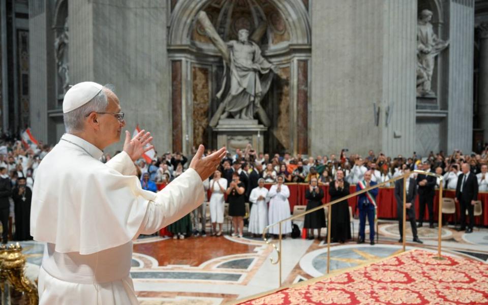 Pope Leo XIV greets visitors and pilgrims during his weekly general audience in St. Peter's Basilica at the Vatican Aug. 19, 2026. (CNS/Vatican Media)