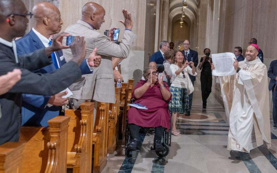 After being handed the apostolic letter from Pope Leo XIV appointing him as a new auxiliary bishop of Washington, Bishop Robert Boxie III displays the document during his ordination Mass July 7, 2026, at the Basilica of the National Shrine of the Immaculate Conception in Washington. (OSV News/Catholic Standard/Mihoko Owada)