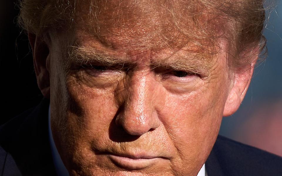 President Donald Trump speaks to reporters before boarding Marine One on the South Lawn of the White House, Thursday, Oct. 22, 2026, in Washington. (AP/Julia Demaree Nikhinson)