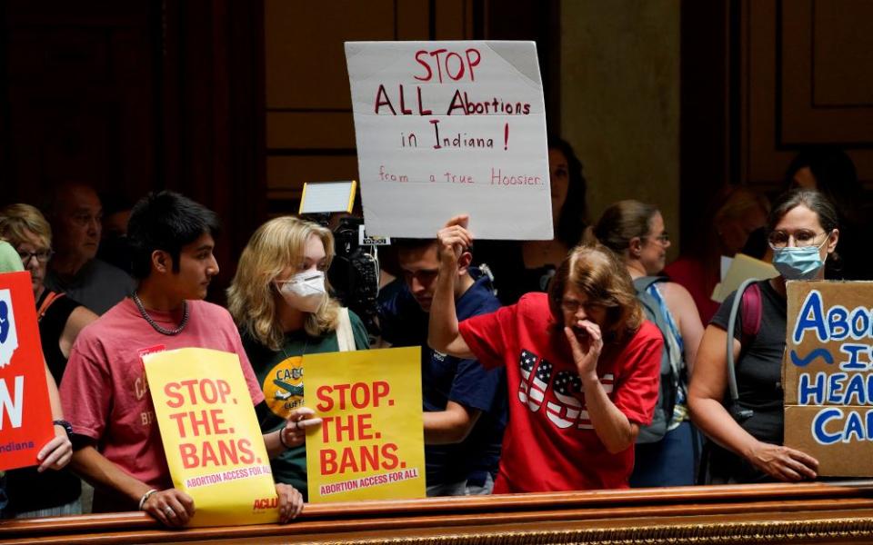 Activists protest inside the Indiana Statehouse in Indianapolis July 25 during a special session debate on banning abortion. (CNS/Reuters/Cheney Orr)