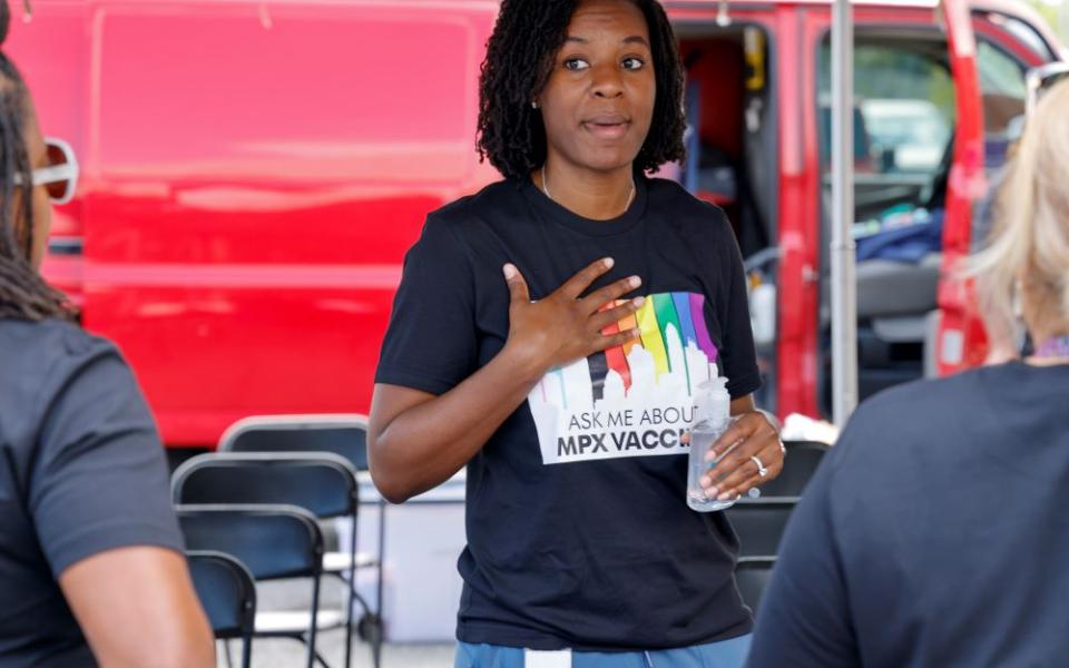 Tyler Green, preparedness help manager with the Mecklenburg County Public Health Department, talks to volunteers at a monkeypox vaccination clinic in Charlotte, N.C., Aug. 20. (AP/Nell Redmond)