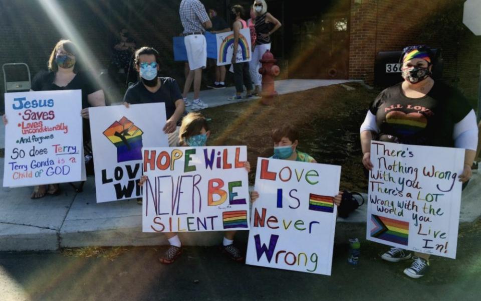 Protesters rally for Terry Gonda, a married lesbian who was fired from her role as music director at St. John Fisher Chapel University Parish in Auburn Hills, Michigan. (Between the Lines/Ellen Shanna Knoppow)