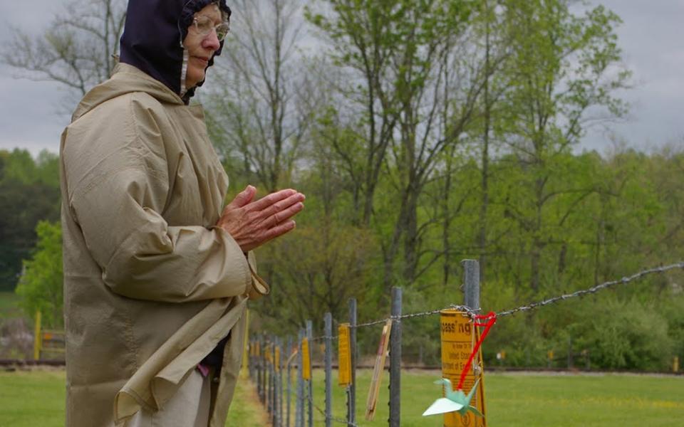 Presentation Sr. Mary Dennis Lenstch prays during a peace witness outside the Y-12 Nuclear Weapons Complex near Oak Ridge, Tennessee, in April 2011. (NCR photo/Joshua J. McElwee)