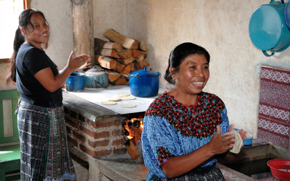 Friendship Bridge clients in Guatemala make tortillas to sell.