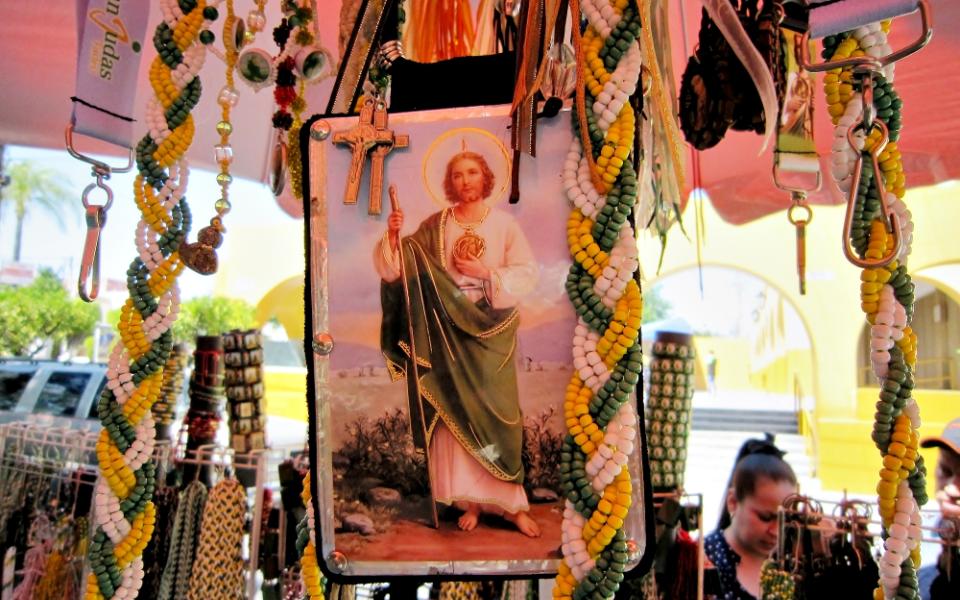 Merchants bring St. Jude Thaddeus imagery from Mexico City to sell outside of the iconic church named for him in Guadalajara, Mexico. (Stephen Woodman)