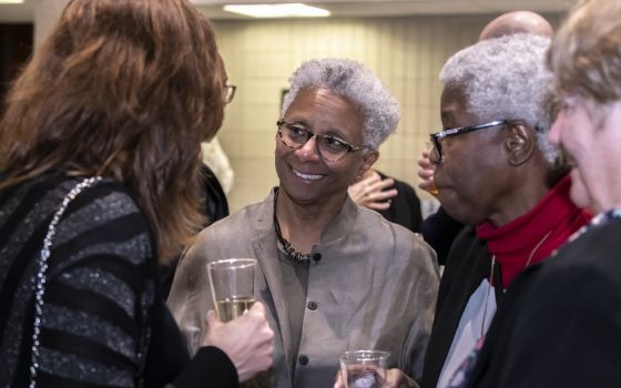 Theologian M. Shawn Copeland, center, speaks to guests on April 26 during the Boston College conference held in her honor. (Boston College/Lee Pellegrini)