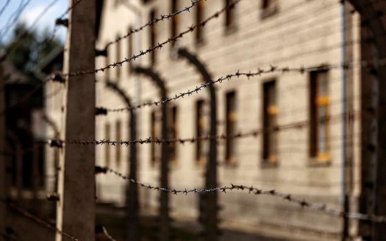 Lines of barbed-wire fencing enclose the Auschwitz-Birkenau Nazi death camp in Oświęcim, Poland, in this Sept. 4, 2015, file photo. (CNS/Nancy Wiechec)