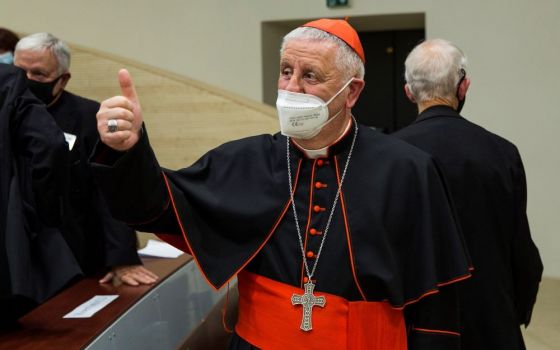 Cardinal Giuseppe Versaldi, prefect of the Congregation for Catholic Education, gives a thumbs up during the Oct. 14 inauguration of the Institute of Anthropology: Interdisciplinary Studies on Human Dignity and Care at the Pontifical Gregorian University.