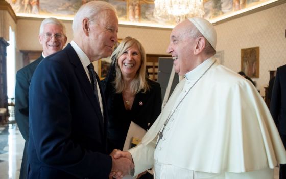 President Joe Biden greets Pope Francis at the Vatican Oct. 29. The two met privately for about 75 minutes. (CNS/Vatican Media)