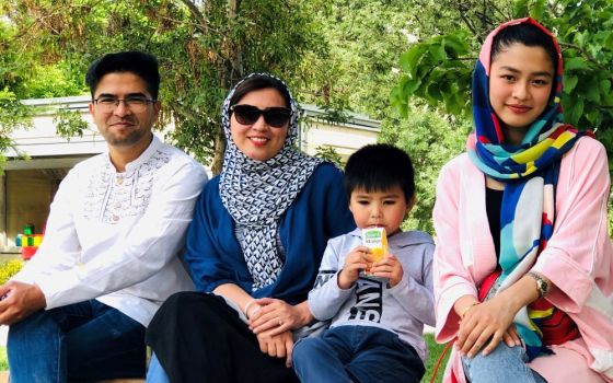 Basir Bita (left), his wife Hosnia, 5-year-old son Barbod and 17-year-old daughter Mahdia arrived in Canada Oct. 22 after a harrowing journey from Afghanistan. Basir Bita plans to pursue a master's degree in mental health counseling from Marquette Univers