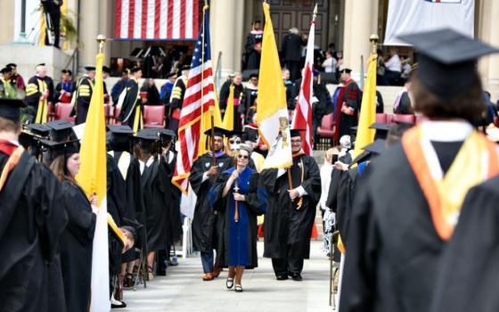 Catholic University of America students and faculty celebrate graduation May 12, 2018. (CNS/The Catholic University of America/Dana Rene Bowler)