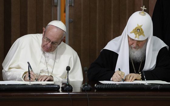 Pope Francis and Russian Orthodox Patriarch Kirill of Moscow sign a joint declaration during a meeting at Jose Marti International Airport Feb. 12, 2016, in Havana. (CNS/Paul Haring)