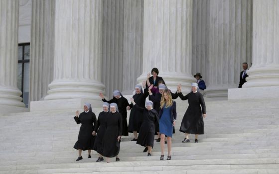 Members of the Little Sisters of the Poor and other women walk down the steps of the U.S. Supreme Court in Washington in March 2016 after attending oral arguments in the Zubik v. Burwell contraceptive mandate case. (CNS/Reuters/Joshua Roberts)