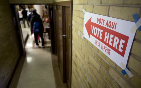 Voters enter the John Bailey Room at St. Francis Xavier Church in Washington Nov. 8, 2016. (CNS/Tyler Orsburn)