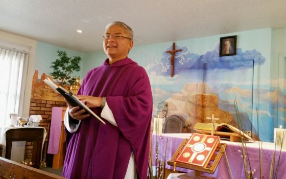 Fr. Rafael Bercasio speaks to tourists gathered for Sunday Mass in late March at El Cristo Rey Chapel in Grand Canyon National Park in Arizona. (CNS/Florida Catholic/Ana Rodriguez-Soto)