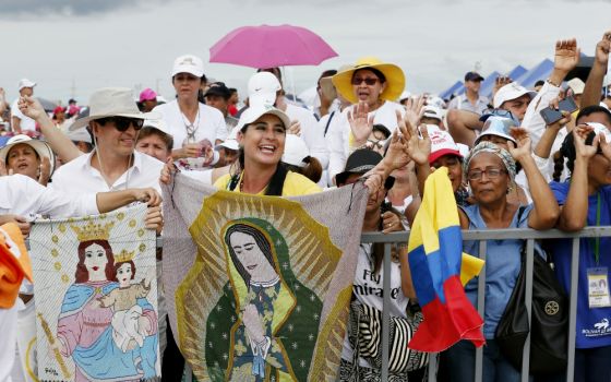 People celebrate as Pope Francis celebrates Mass at Contecar terminal in Cartagena, Colombia, Sept. 10. (CNS/Paul Haring)