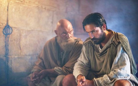 James Faulkner as Paul and Jim Caviezel as Luke are seen in the film "Paul, Apostle of Christ." (CNS/Sony Pictures)
