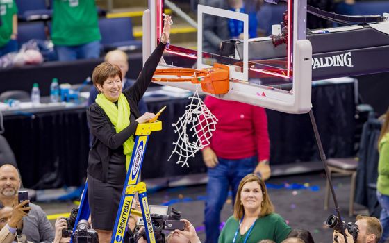 Muffet McGraw, head coach of the Notre Dame women's basketball team, cuts the net after her players defeated Mississippi State 61-58 April 1, 2018, in the championship game of the Final Four of the NCAA Tournament in Columbus, Ohio. (CNS)