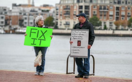 Protesters demonstrate Nov. 13 outside the U.S. Conference of Catholic Bishops meeting in Baltimore. (CNS/Reuters/Theresa Keil)