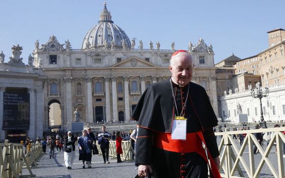 Cardinal Marc Ouellet, prefect of the Congregation for Bishops, walks through St. Peter's Square after attending the opening session of the meeting on the protection of minors in the church at the Vatican Feb. 21, 2019. (CNS/Paul Haring)