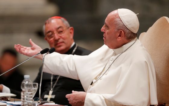Pope Francis gestures as he addresses more than 1,000 diocesan leaders, both clergy and laity, May 9, 2019, at the Basilica of St. John Lateran, the cathedral of the Diocese of Rome. Seated next to the pope is Cardinal Angelo de Donatis, vicar of Rome. (C