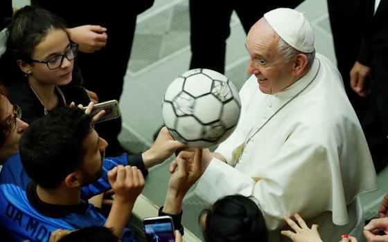 Pope Francis participates alongside thousands of young soccer athletes in a project to promote the values of sport and soccer at the Vatican May 24, 2019. (CNS/Reuters/Remo Casilli)