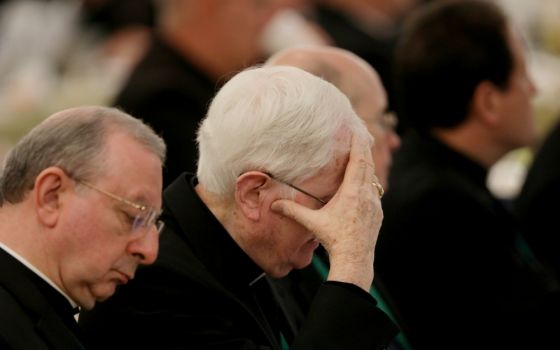 A bishop reacts on the first day of the spring general assembly of the U.S. Conference of Catholic Bishops in Baltimore June 11. (CNS/Bob Roller)