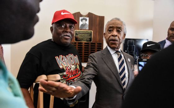 The Rev. Al Sharpton from the National Action Network speaks with hecklers after a July 29, 2019, news conference addressing U.S. President Donald Trump's tweets about Baltimore. (CNS photo/Stephanie Keith, Reuters)