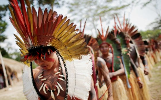 Shanenawa people dance Sept. 1 during a festival to celebrate nature and ask for an end to the burning of the Amazon, in the indigenous village of Morada Nova near Feijo, Brazil. (CNS/Reuters/Ueslei Marcelino)