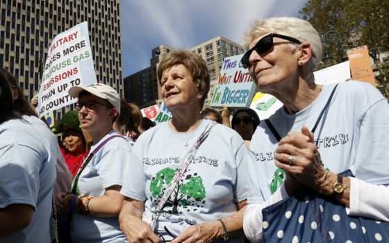 Sr. Helen Kearney, center, president of the Sisters of St. Joseph of Brentwood, New York, and St. Joseph Sr. Mary Doyle, right, participate in the Global Climate Strike in New York City Sept. 20, 2019. (CNS/Gregory A. Shemitz)