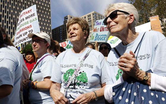 Sr. Helen Kearney, center, president of the Sisters of St. Joseph of Brentwood, New York, and St. Joseph Sr. Mary Doyle, right, participate in the Global Climate Strike Sept. 20, 2019, in New York City. (CNS/Gregory A. Shemitz)