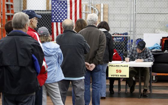 Voters line up prior to casting their ballots at a polling station in Nesconset, New York, on Election Day Nov. 6, 2018. (CNS/Gregory A. Shemitz)