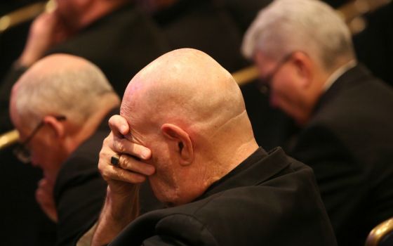 Bishops pray before the Blessed Sacrament in the chapel during a day of prayer Nov. 12, 2018, before hearing from abuse survivors at their fall general assembly in Baltimore. (CNS/Bob Roller)
